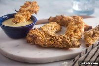 Crispy Baked Buttermilk Chicken Tenders with Honey Mustard Dip