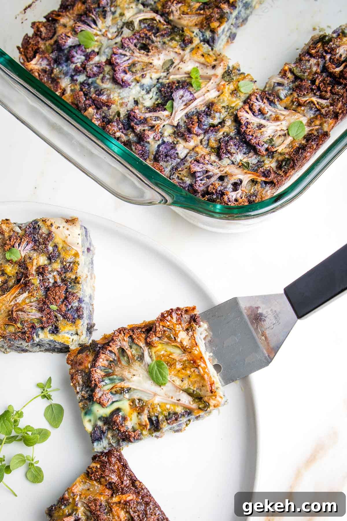 Cauliflower kugel in a baking dish and with spatula on plate.
