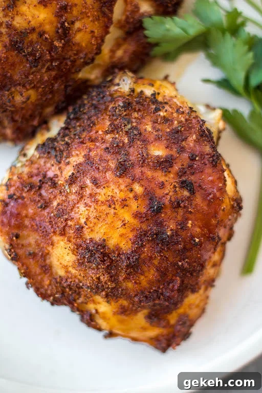 Air Fryer Bone-In Chicken Thighs | Whole30, Keto, Gluten-Free 4 Seasoned air fryer chicken thighs