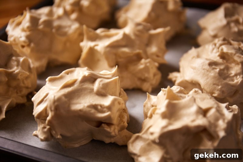 Natural no added sugar meringues with date syrup — perfect as a treat or dessert topping.