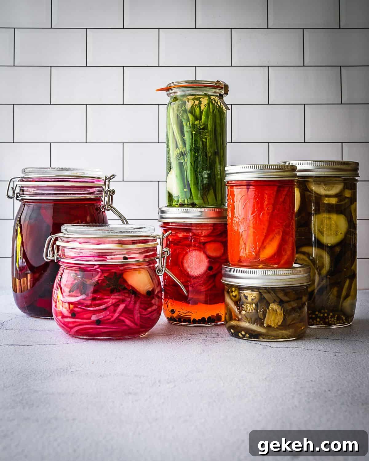Pickle jars on a counter.