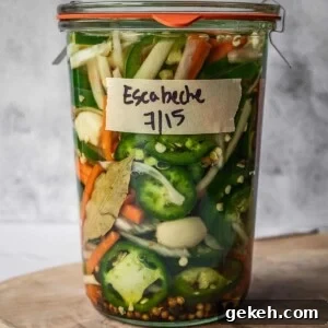 Mason jar full of Mexican pickled vegetables.