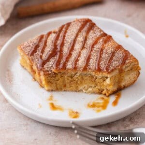 Churro Pumpkin Cheesecake Bars Recipe — Step-by-Step Guide 11 Churro Pumpkin cheesecake bars on a plate with a bite taken out