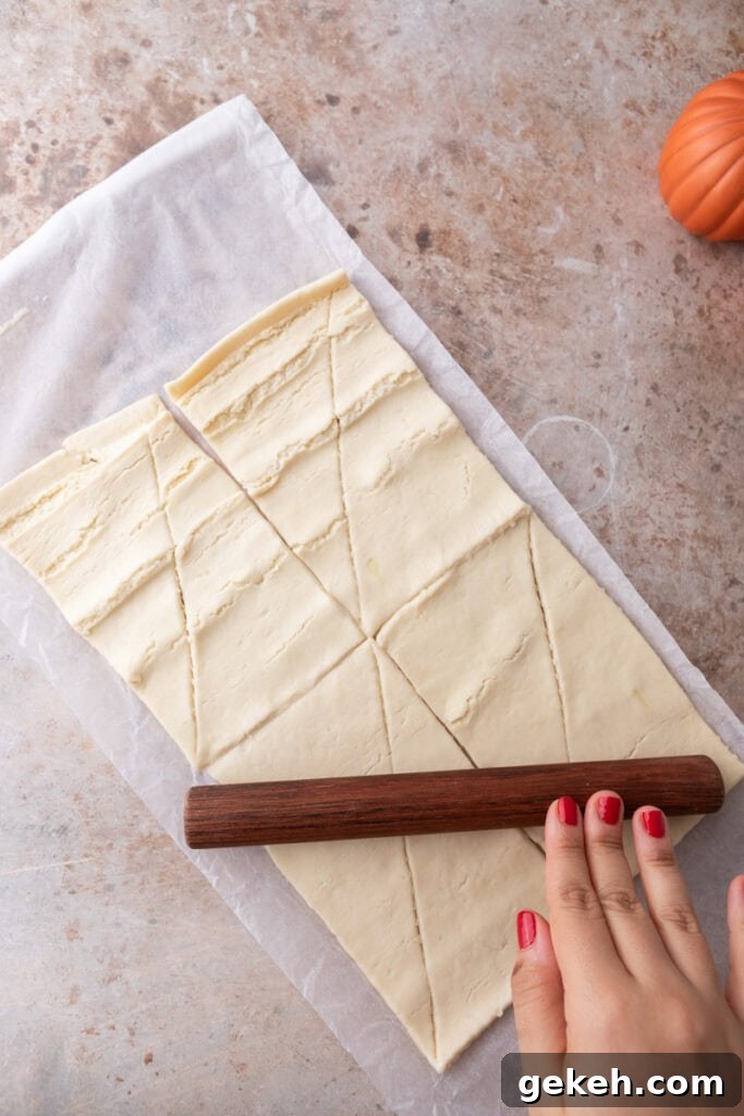 Churro Pumpkin Cheesecake Bars Recipe — Step-by-Step Guide 6 can of dough rolled out