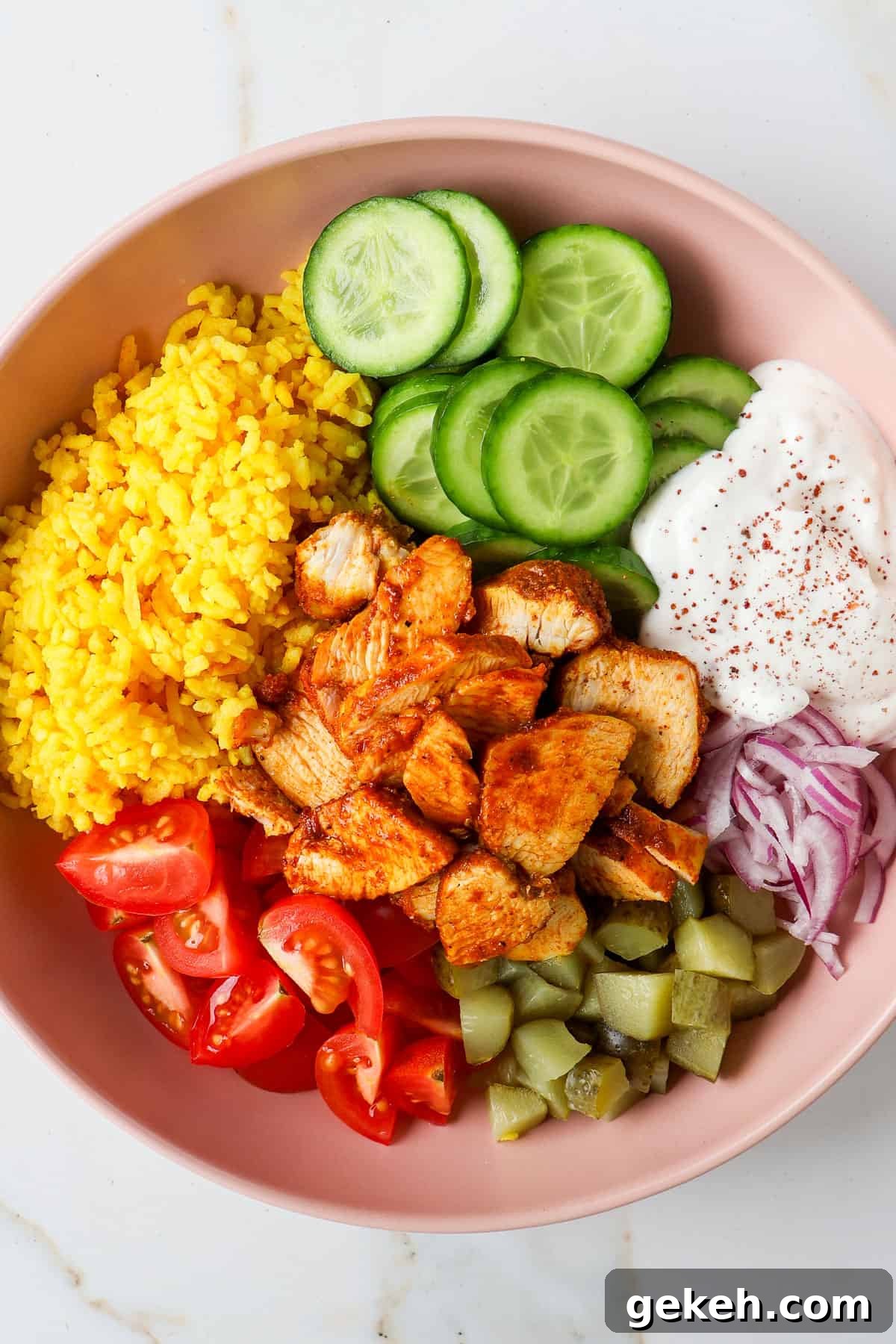 Chicken Shawarma Bowls with Garlic Sauce and Rice 3 Chicken shawarma rice bowl.