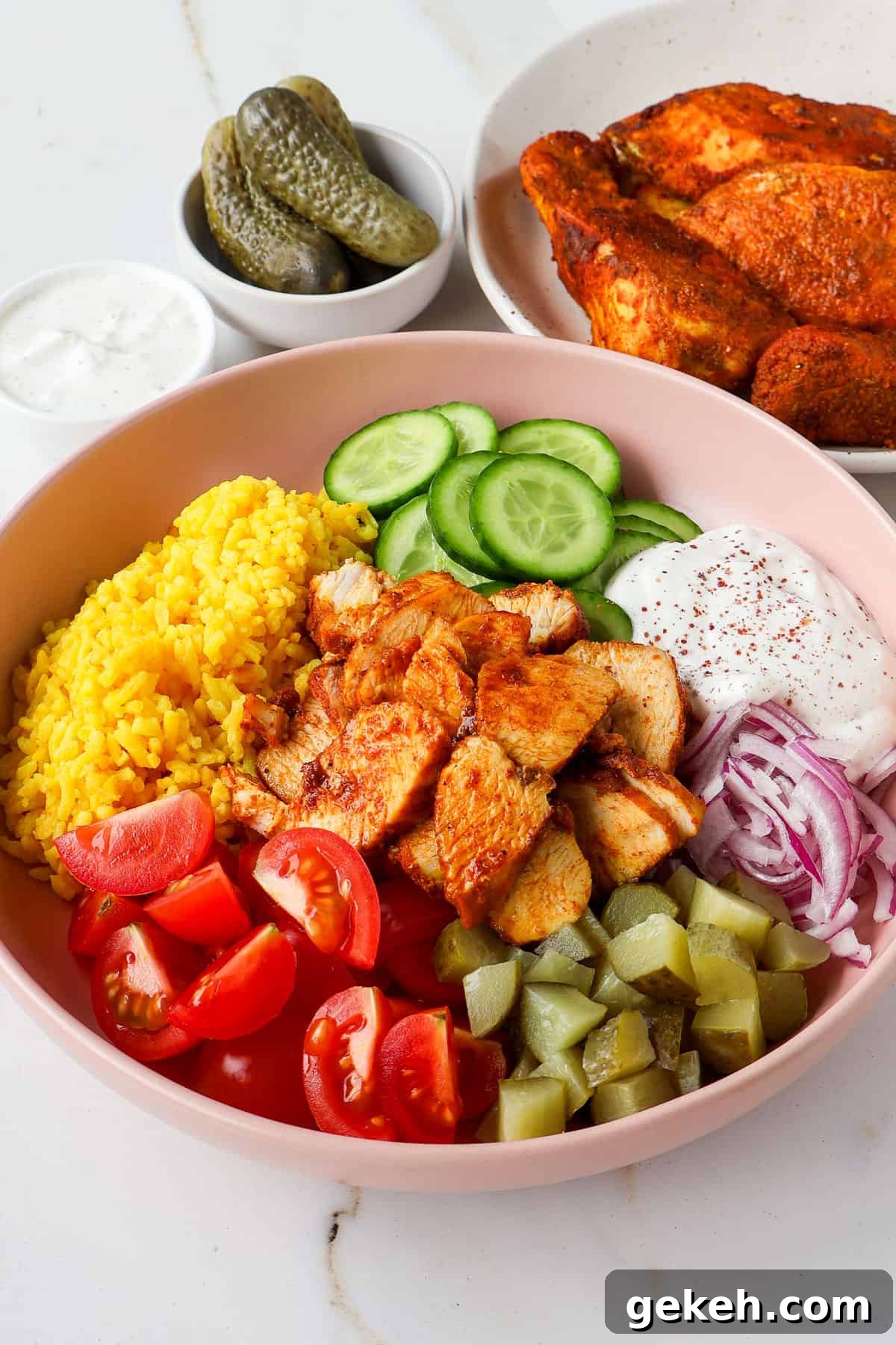 Chicken Shawarma Bowls with Garlic Sauce and Rice 9 Side shot of chicken shawarma bowls.
