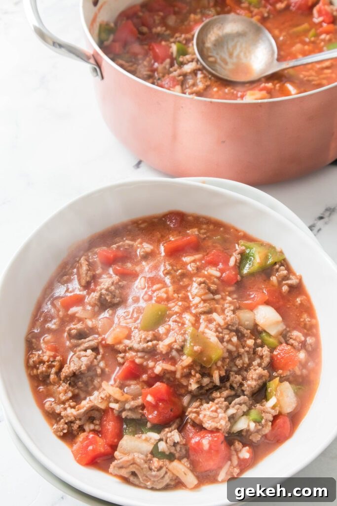 Hearty Stuffed Pepper Soup Recipe for Cozy Weeknight Meals 2 Stuffed Pepper Soup in a white bowl