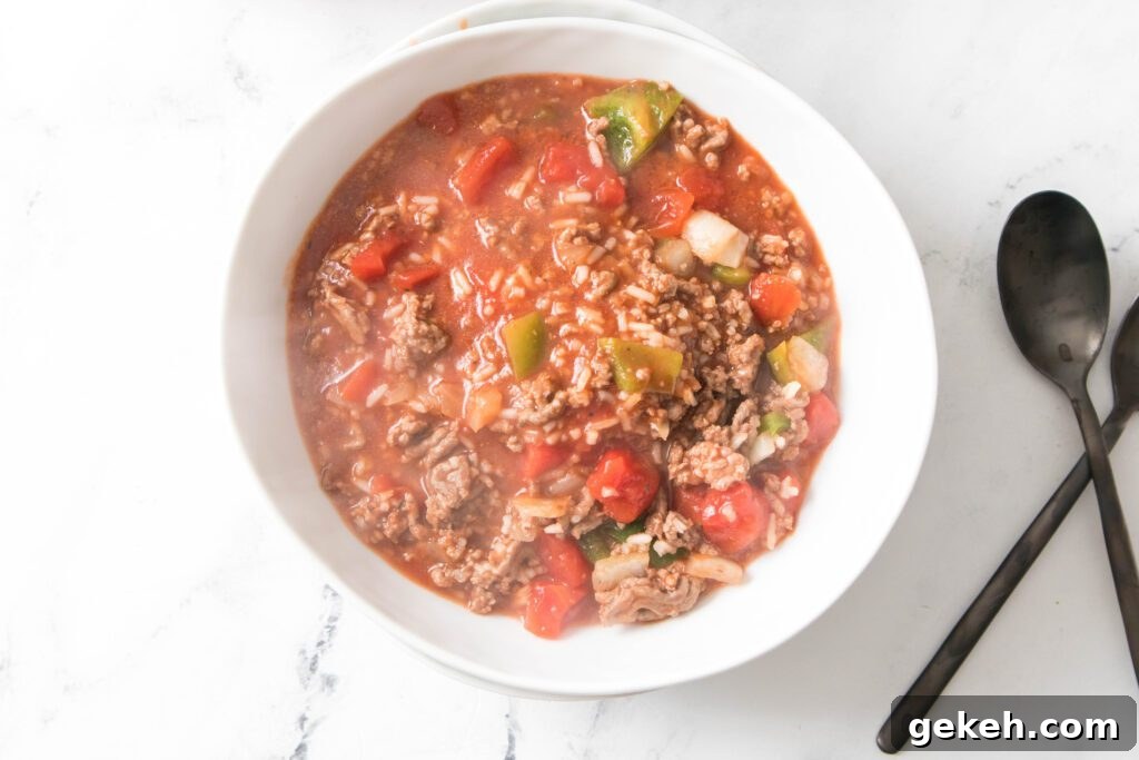 Hearty Stuffed Pepper Soup Recipe for Cozy Weeknight Meals 6 Stuffed Pepper Soup in a white bowl