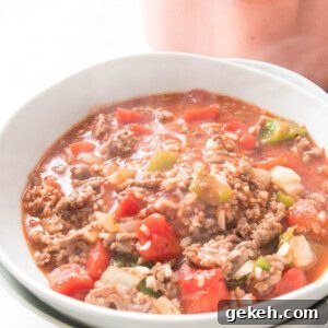 Hearty Stuffed Pepper Soup Recipe for Cozy Weeknight Meals 7 Stuffed Pepper Soup in a white bowl