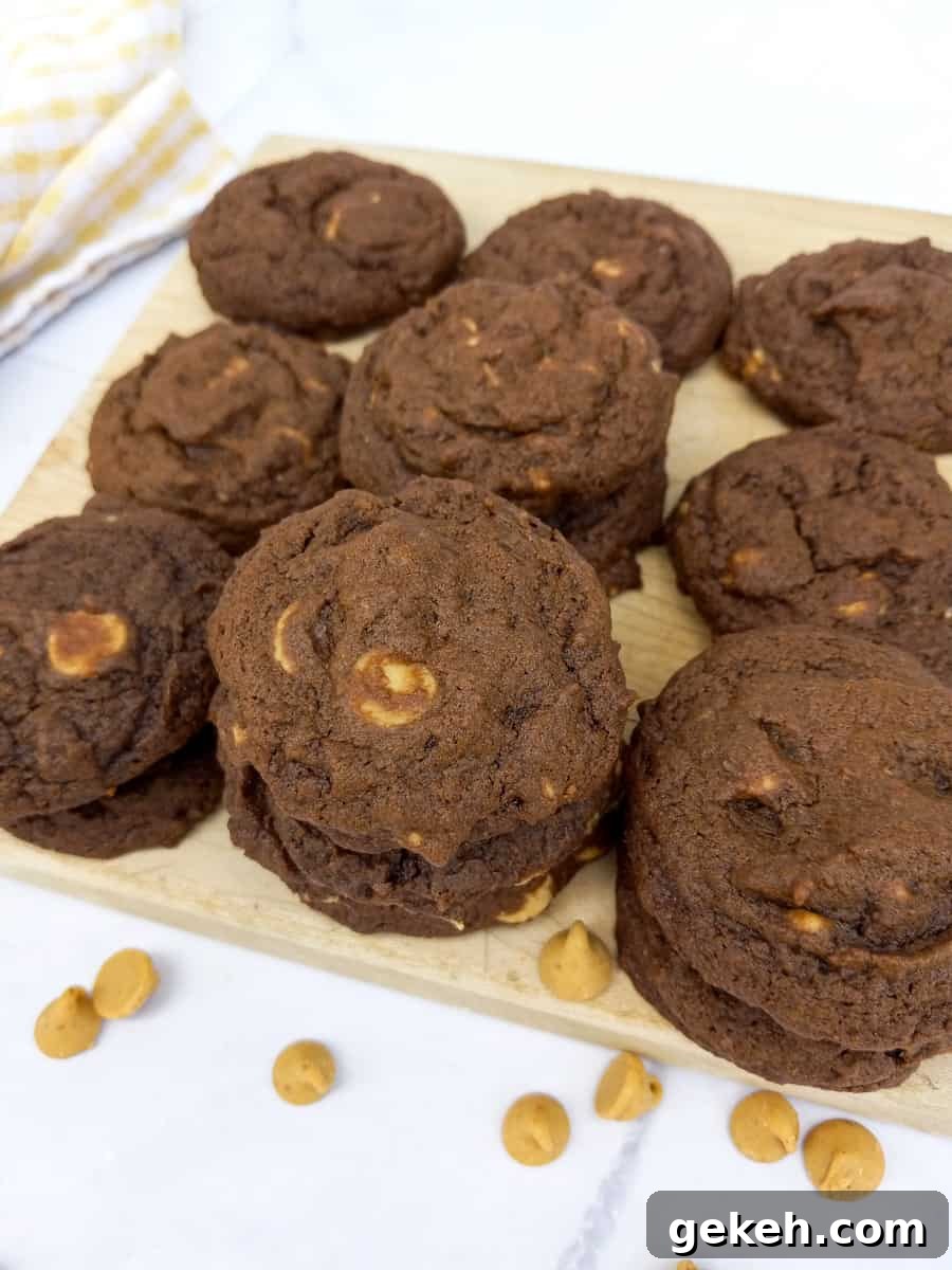 Amish Chocolate Peanut Butter Chip Cookies Recipe 5 chocolate cookies stacked on board