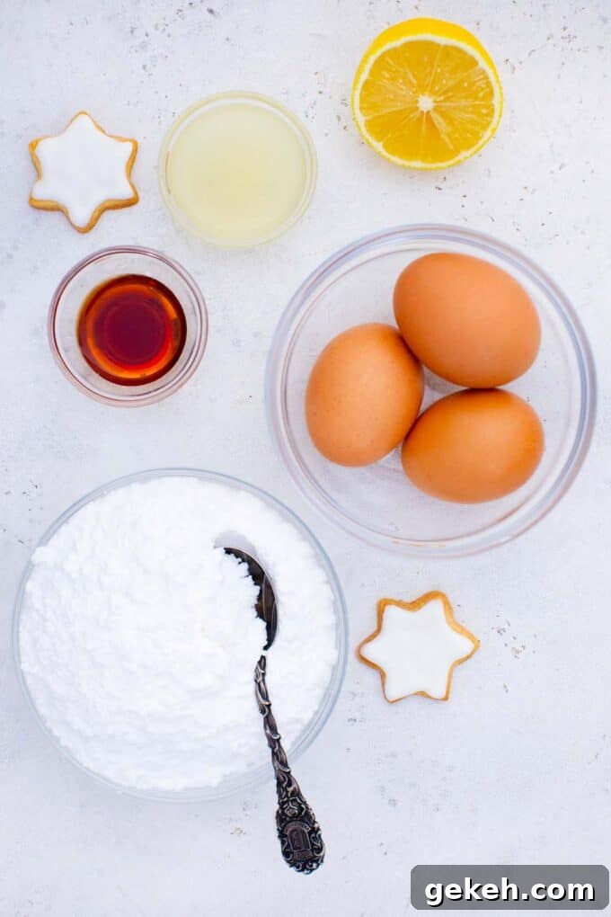 How to Make Smooth Royal Icing for Perfect Cookies and Cakes 3 overhead shot of royal icing ingredients in bowls on a table