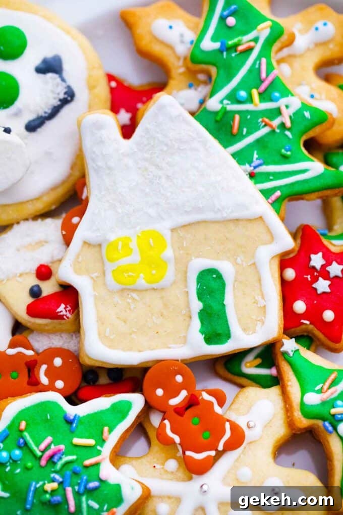 How to Make Smooth Royal Icing for Perfect Cookies and Cakes 10 sugar cookies in different shapes topped with royal icing