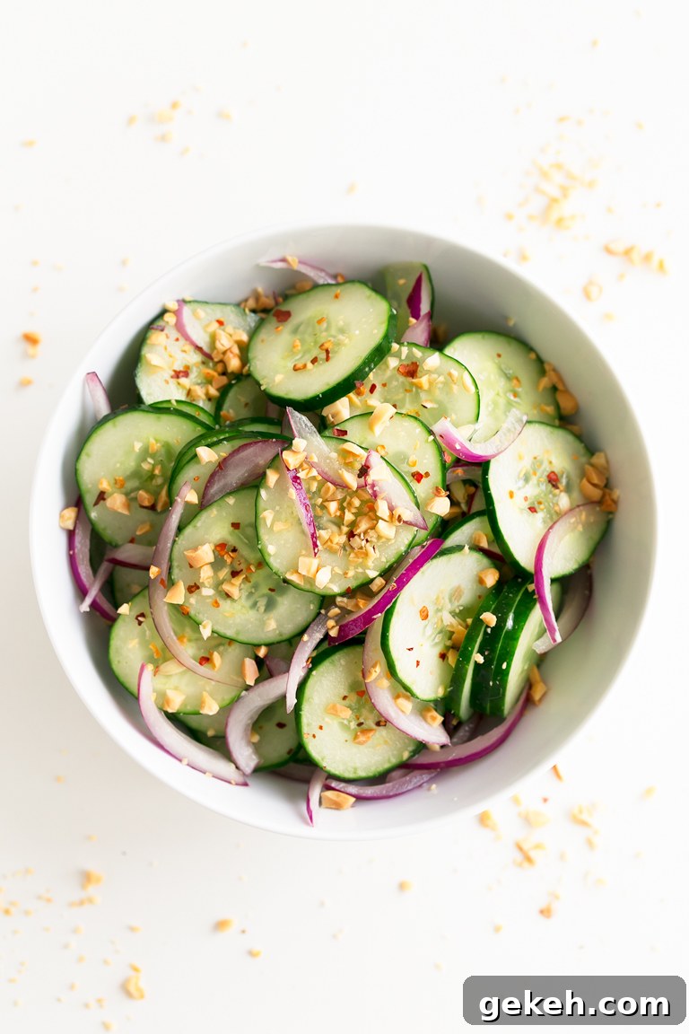 Refreshing Thai Cucumber Salad Recipe with Tangy Dressing 2 Thai Cucumber Salad - Thai cucumber salad, made in less than 10 minutes, using simple ingredients. It's so tasty, healthy, refreshing and the perfect side dish. #vegan #glutenfree #simpleveganblo