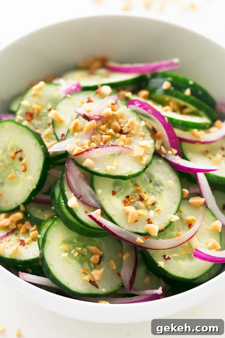 Refreshing Thai Cucumber Salad Recipe with Tangy Dressing 3 Thai Cucumber Salad - Thai cucumber salad, made in less than 10 minutes, using simple ingredients. It's so tasty, healthy, refreshing and the perfect side dish. #vegan #glutenfree #simpleveganblo