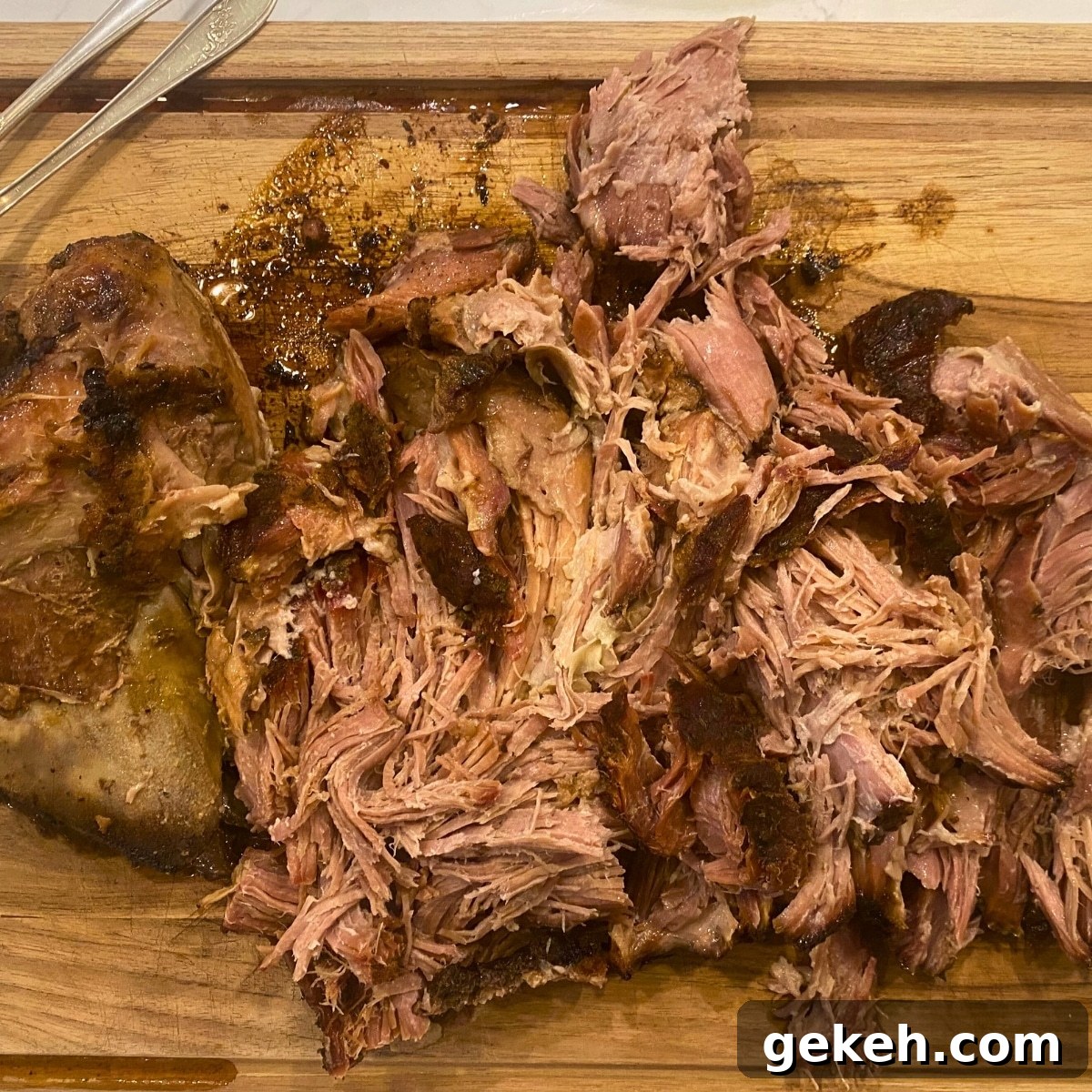 oven roasted pork butt roast on a cutting board. Fall apart tender
