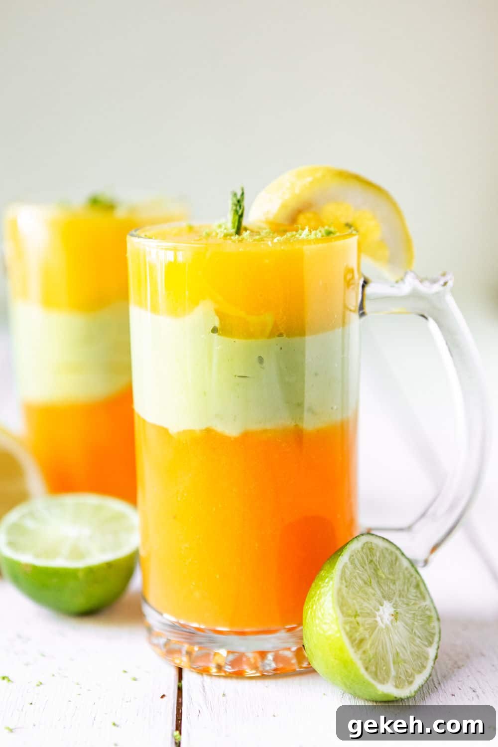 Ethiopian Spices: Authentic Flavors and Cooking Tips 2 two tall glasses filled with Ethiopian spris and limes on the side.