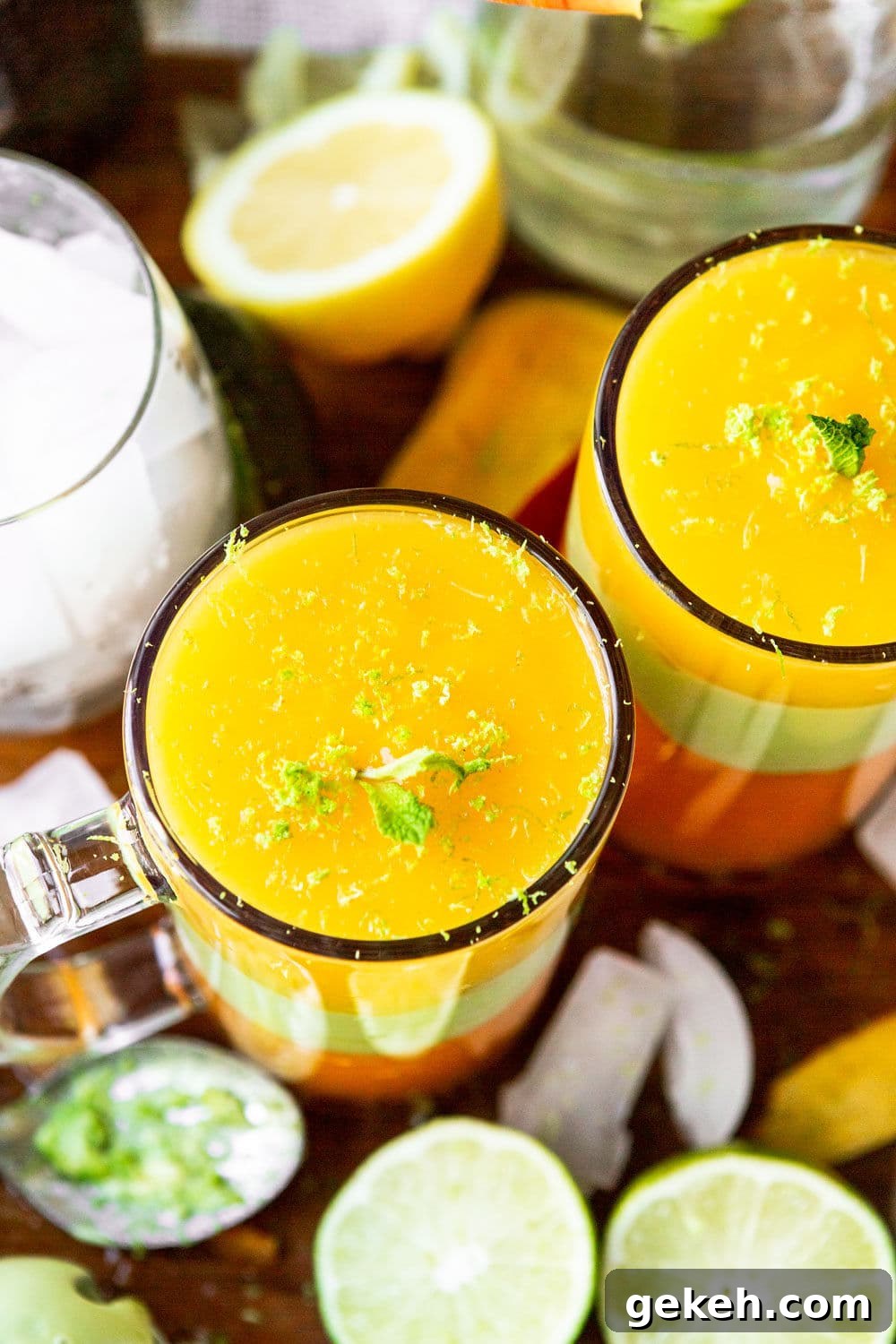 Ethiopian Spices: Authentic Flavors and Cooking Tips 6 two tall glasses with yellow and green juice on a wooden board.