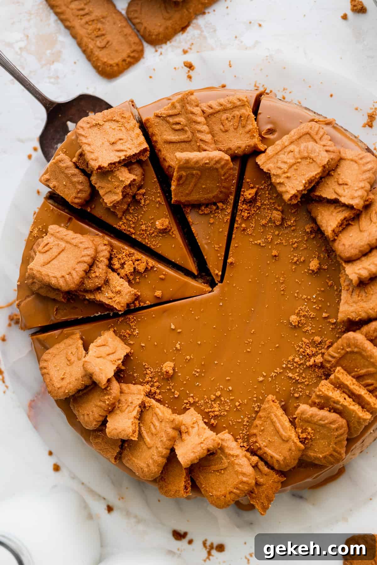 Close up of removing a slice out of the cheesecake.