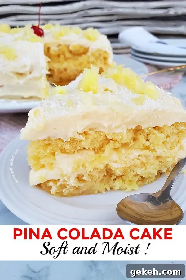 Pina Colada Cake is so soft and moist with an equally delicious frosting - filled with the flavors of the tropical cocktail which just screams Summer ! #PinaColadaCake #SummerCake #PineappleCake