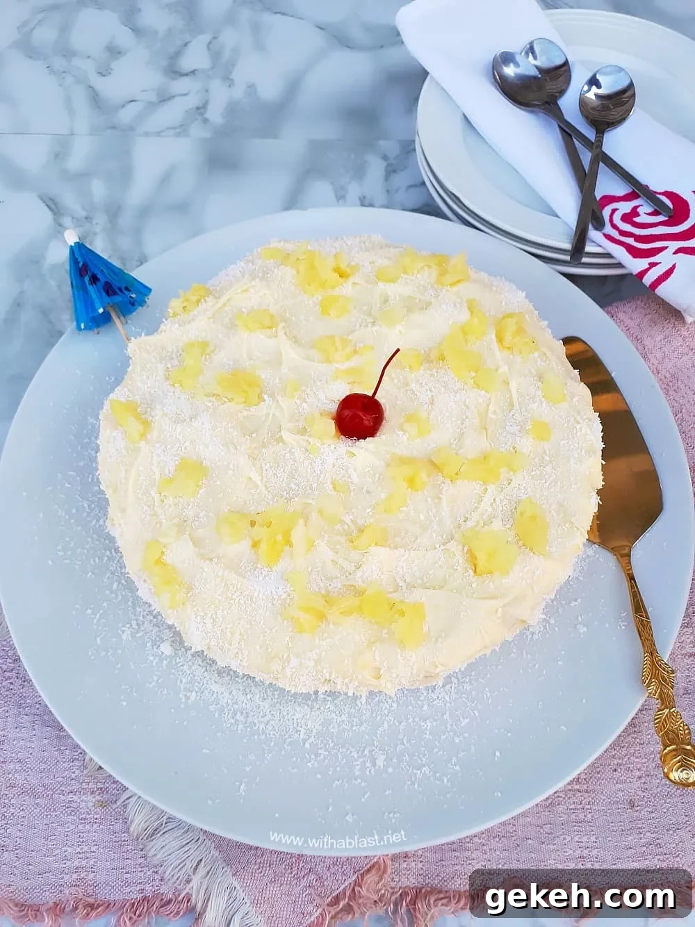 Pina Colada Cake is so soft and moist with an equally delicious frosting - filled with the flavors of the tropical cocktail which just screams Summer !