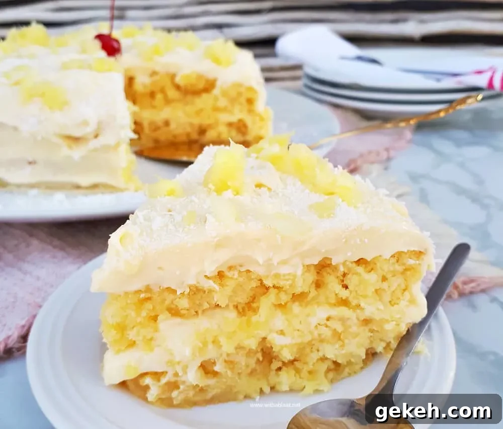 Pina Colada Cake is so soft and moist with an equally delicious frosting - filled with the flavors of the tropical cocktail which just screams Summer !