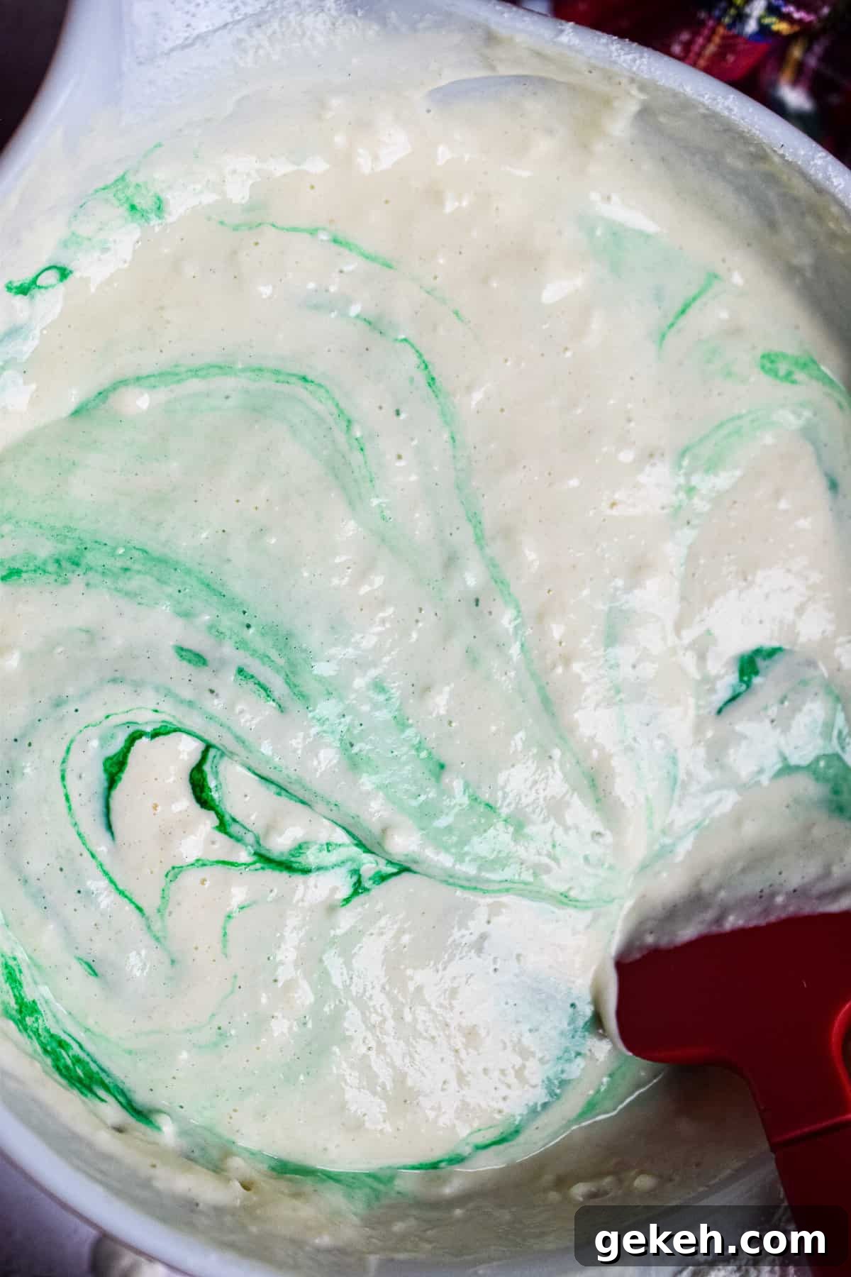 Homemade Grinch Pancakes Recipe — Green St. Patrick’s Breakfast 7 The green food coloring is mixed into the batter.
