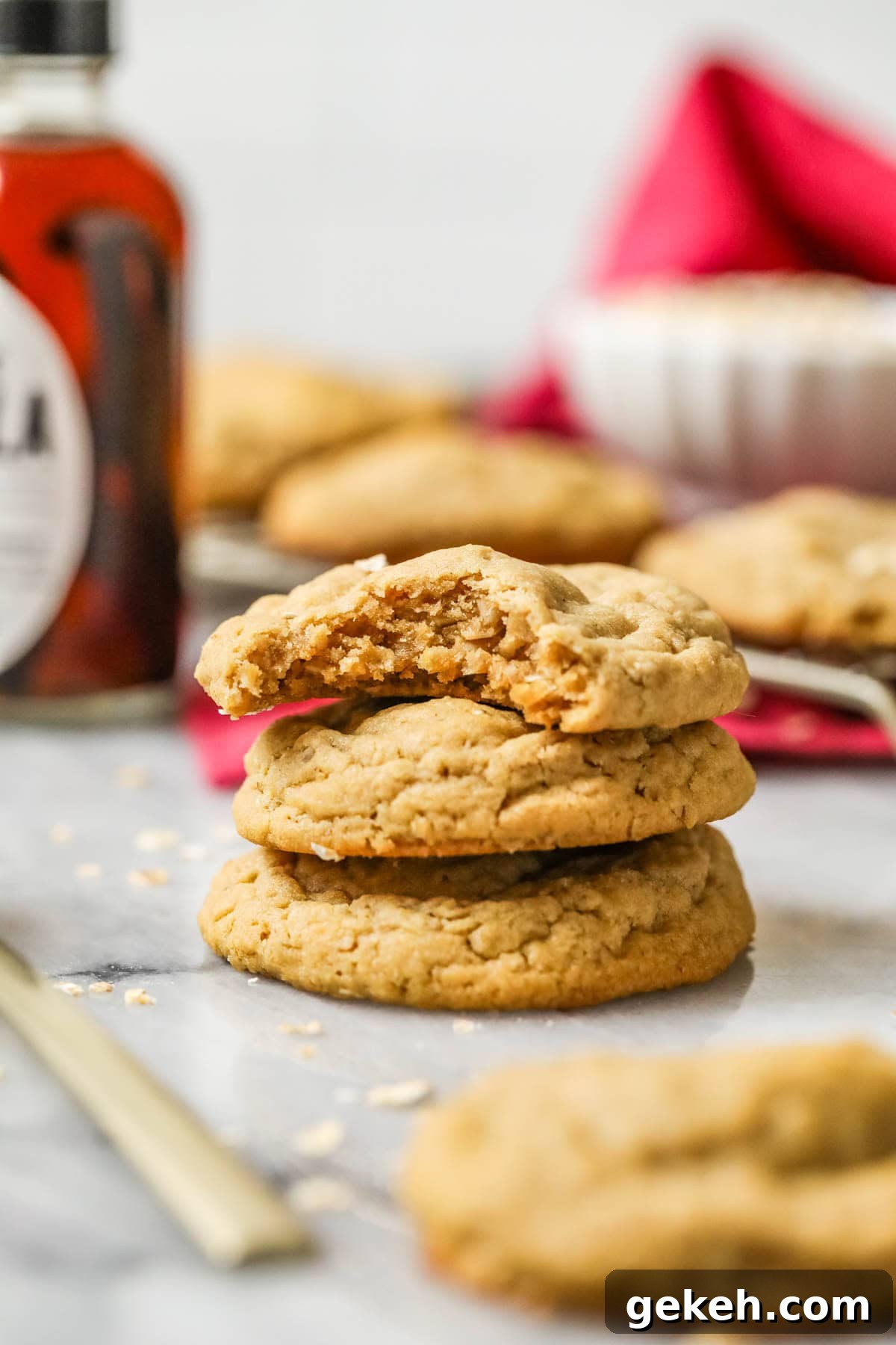 Chewy Peanut Butter Oatmeal Cookie Recipe 6 stack of 3 peanut butter oatmeal cookies, one with a bite missing