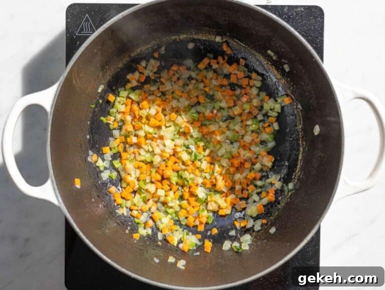 Step 1 Chopped onion carrot and celery cooking in olive oil.