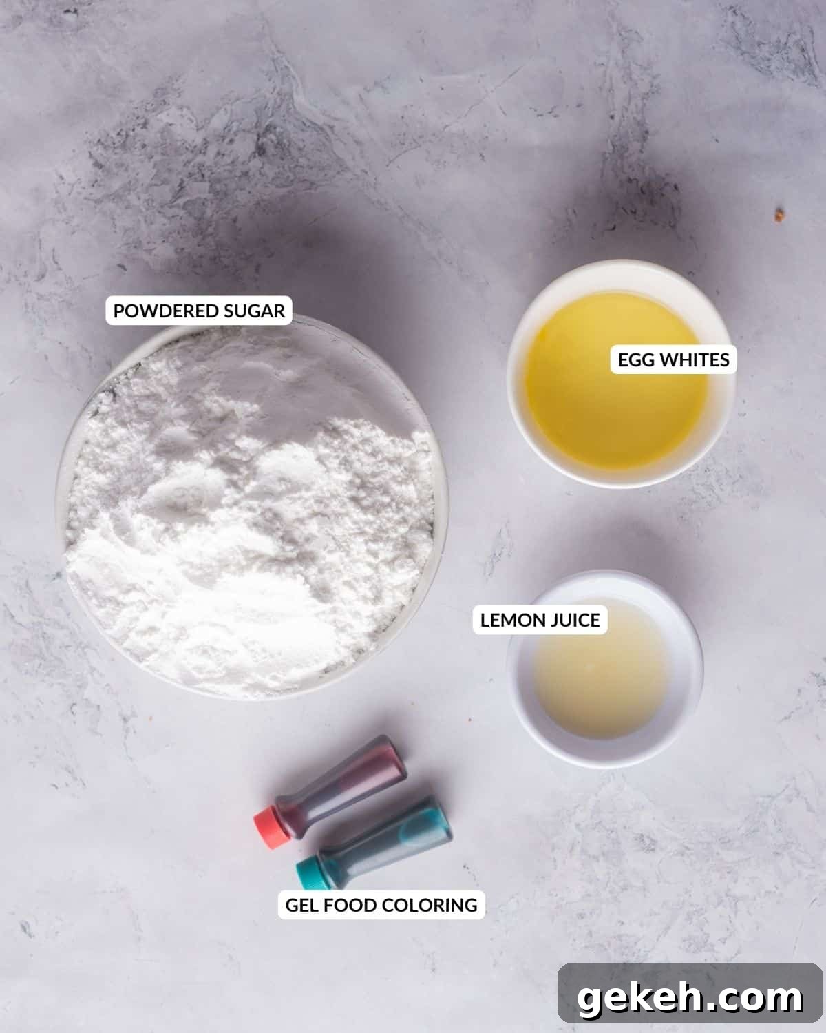 Overhead view of labeled ingredients for the icing for Christmas sugar cookies