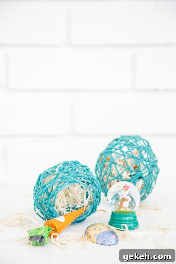 Eggs made with yarn and treats inside.
