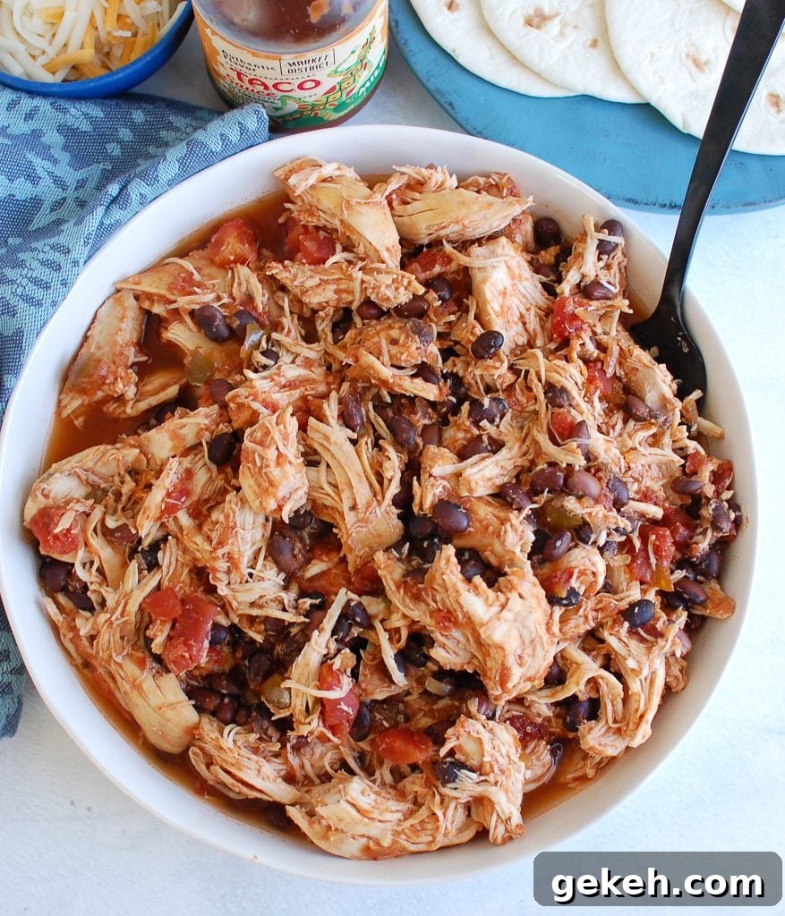 Tender Slow Cooker Shredded Chicken Recipe for Meal Prep 3 Slow Cooker Shredded Chicken with fork