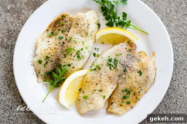 Keto Lemon-Pepper White Fish in the Air Fryer — 15 Minutes 8 Cooked fish on a plate