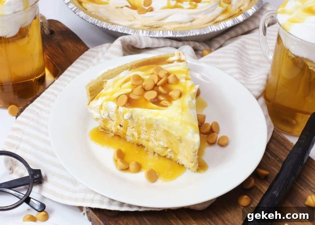 a slice of butterbeer pie topped with caramel sauce on a small white plate