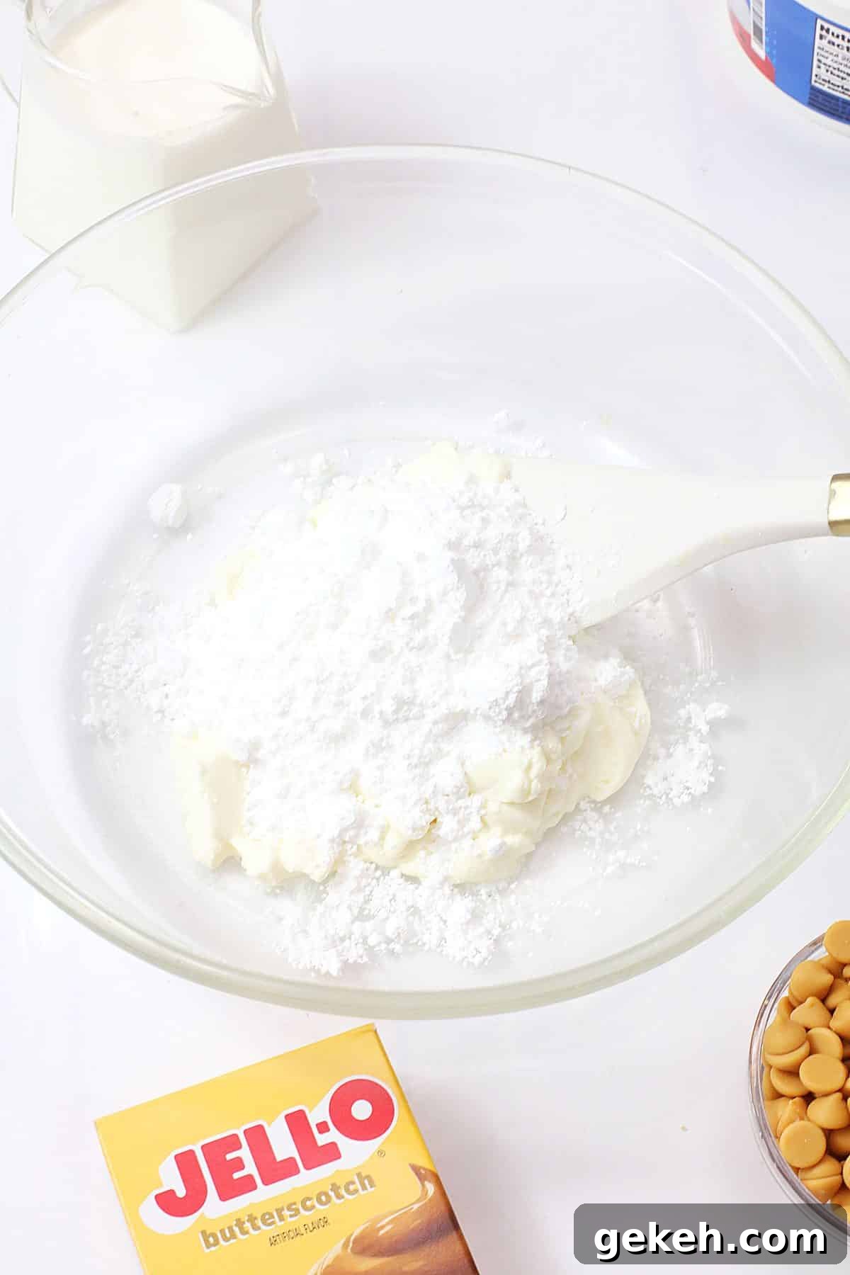 powdered pudding being folded into whipped topping