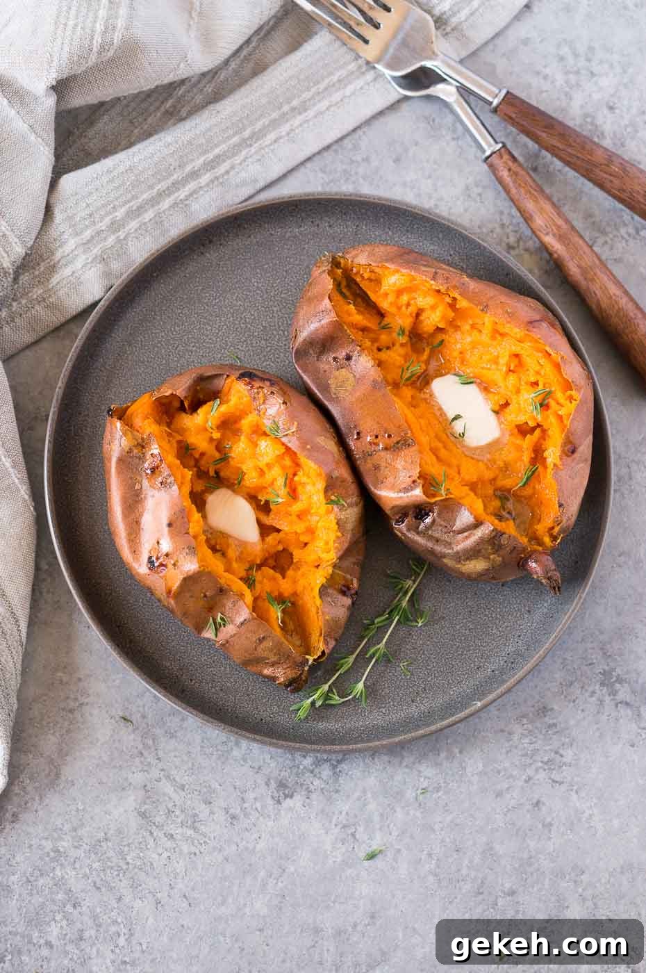 Crispy-Roasted Sweet Potatoes with Garlic and Herbs 7 sweet potatoes served with butter on a plate