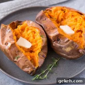 Crispy-Roasted Sweet Potatoes with Garlic and Herbs 8 oven baked sweet potatoes on a plate