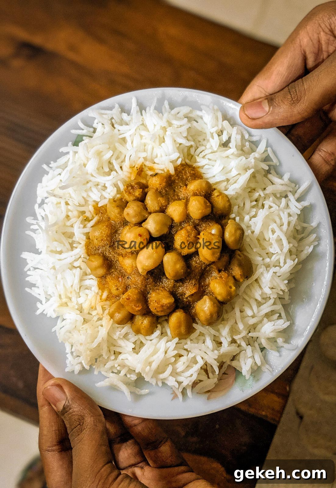 Instant Pot Punjabi Chole (Authentic Chana Masala Recipe) 2 A plate with boiled basmati rice topped with chana masala curry