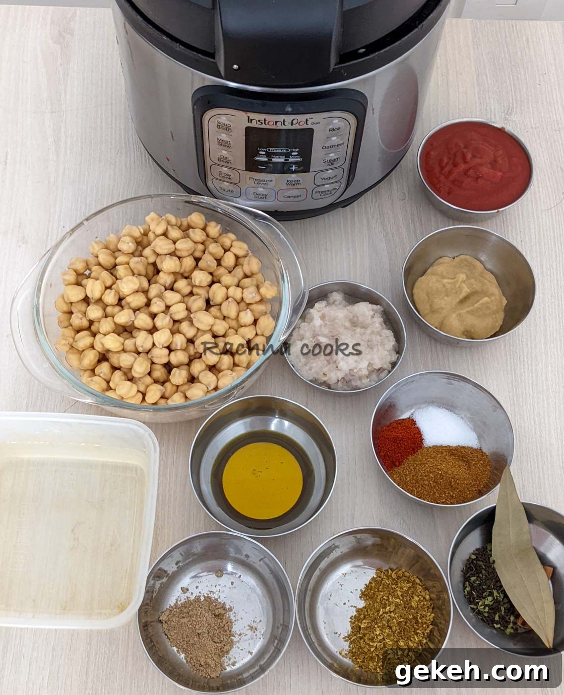 Instant Pot Punjabi Chole (Authentic Chana Masala Recipe) 5 Ingredients to make instant pot chana masala laid out in bowls.