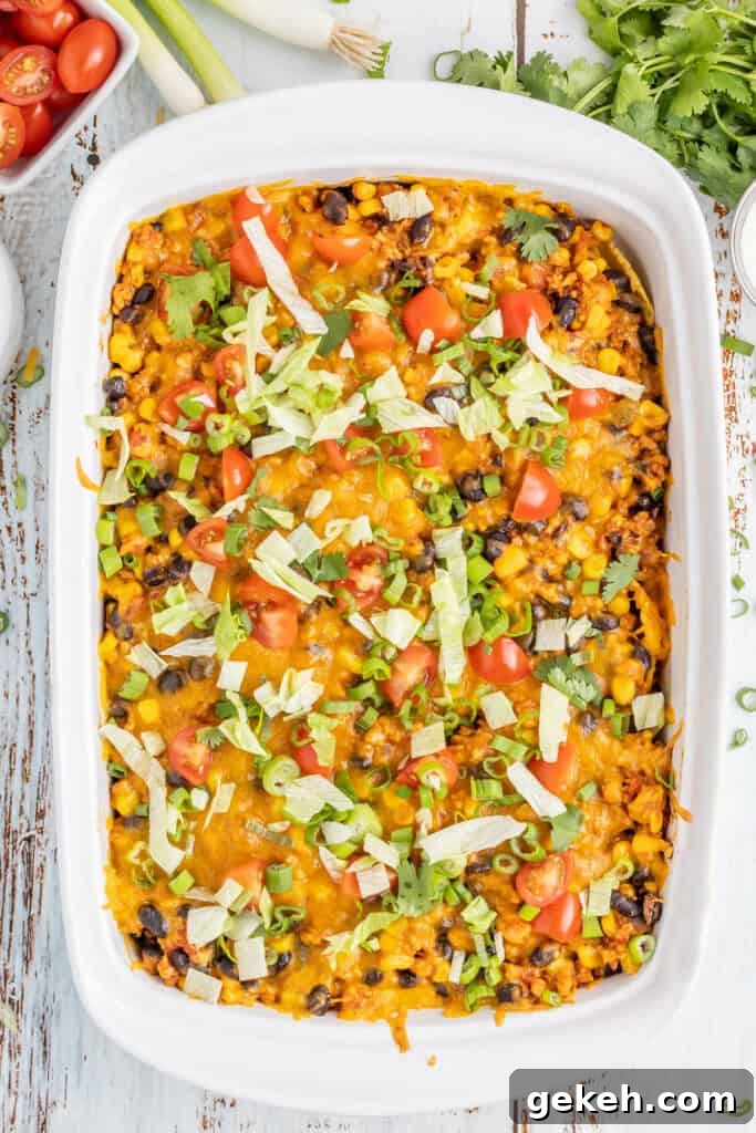 Cheesy Taco Casserole Recipe for Weeknight Dinners 2 white casserole dish with taco casserole