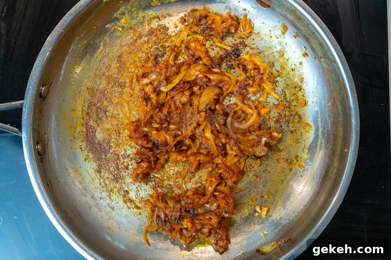 Add the garlic, miso paste and tomato paste