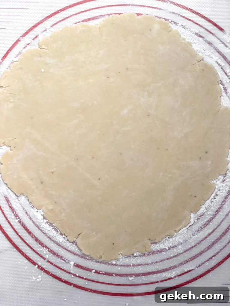 How to Make a Flaky Pie Crust Every Time 15 dough in a large circle before placing in pie tin