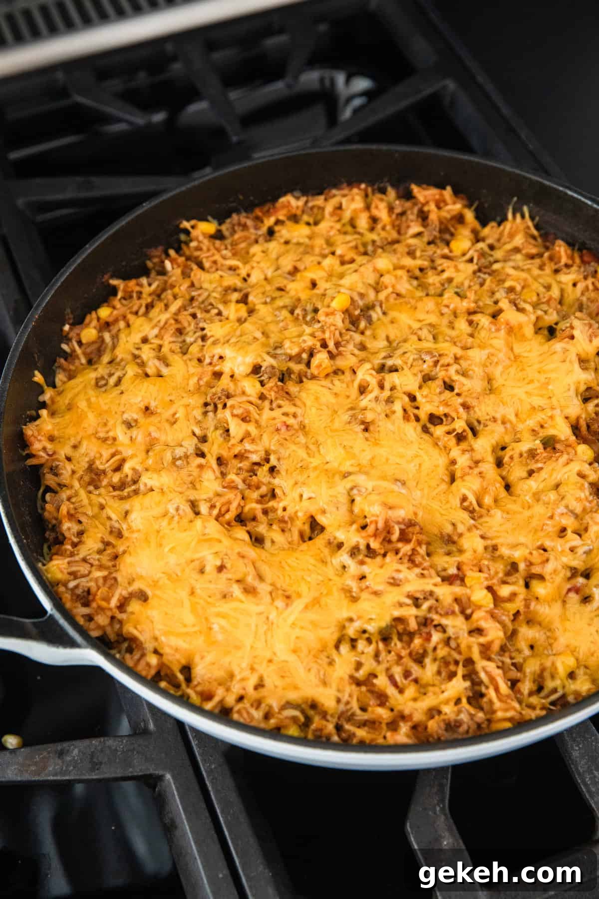 Savory Ground Beef and Salsa Rice Skillet Recipe 7 The melted cheese on the rice.