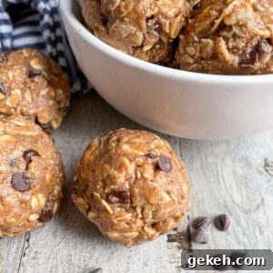 Easy chocolate peanut butter protein balls stored in a white bowl