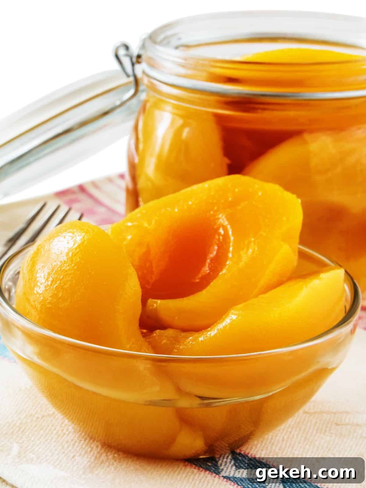 15+ Delicious Canned Peach Recipes for Every Meal 4 a bowl of canned peaches.