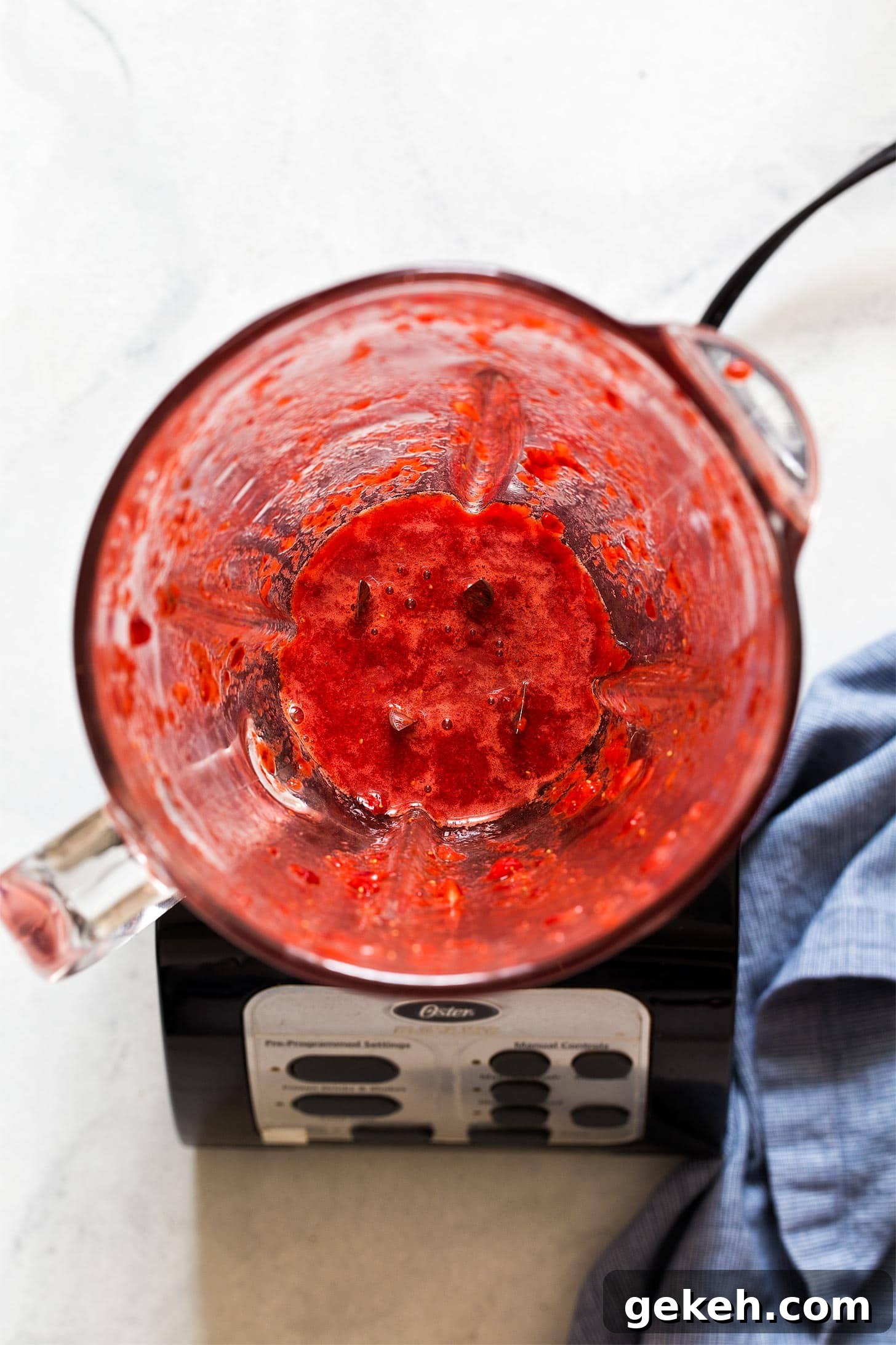 Strawberry Cream Cheese Frosting Recipe for Cakes & Cupcakes 4 Blending strawberries for strawberry cream cheese frosting