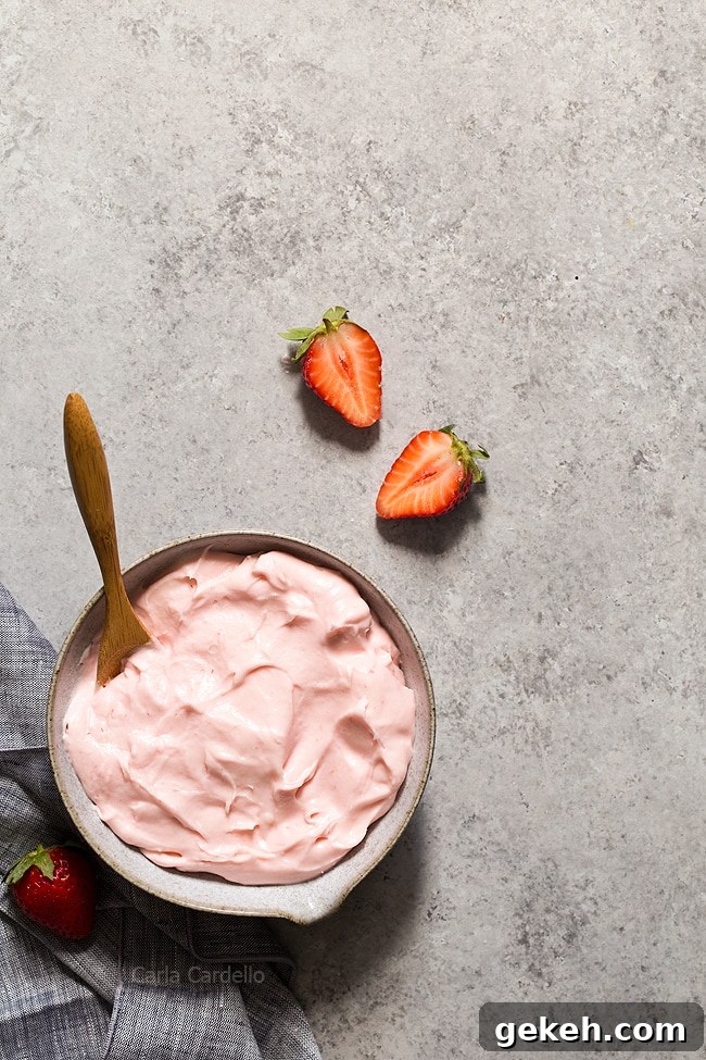 Strawberry Cream Cheese Frosting Recipe for Cakes & Cupcakes 8 Bowl of pink strawberry frosting