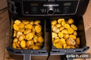 Crispy Air-Fried Baby Potatoes Recipe 8 Chopped baby potatoes seasoned with olive oil and piri piri in two air fryer trays