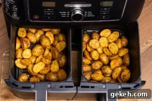 Crispy Air-Fried Baby Potatoes Recipe 9 Cooked Air fryer baby potatoes in two trays