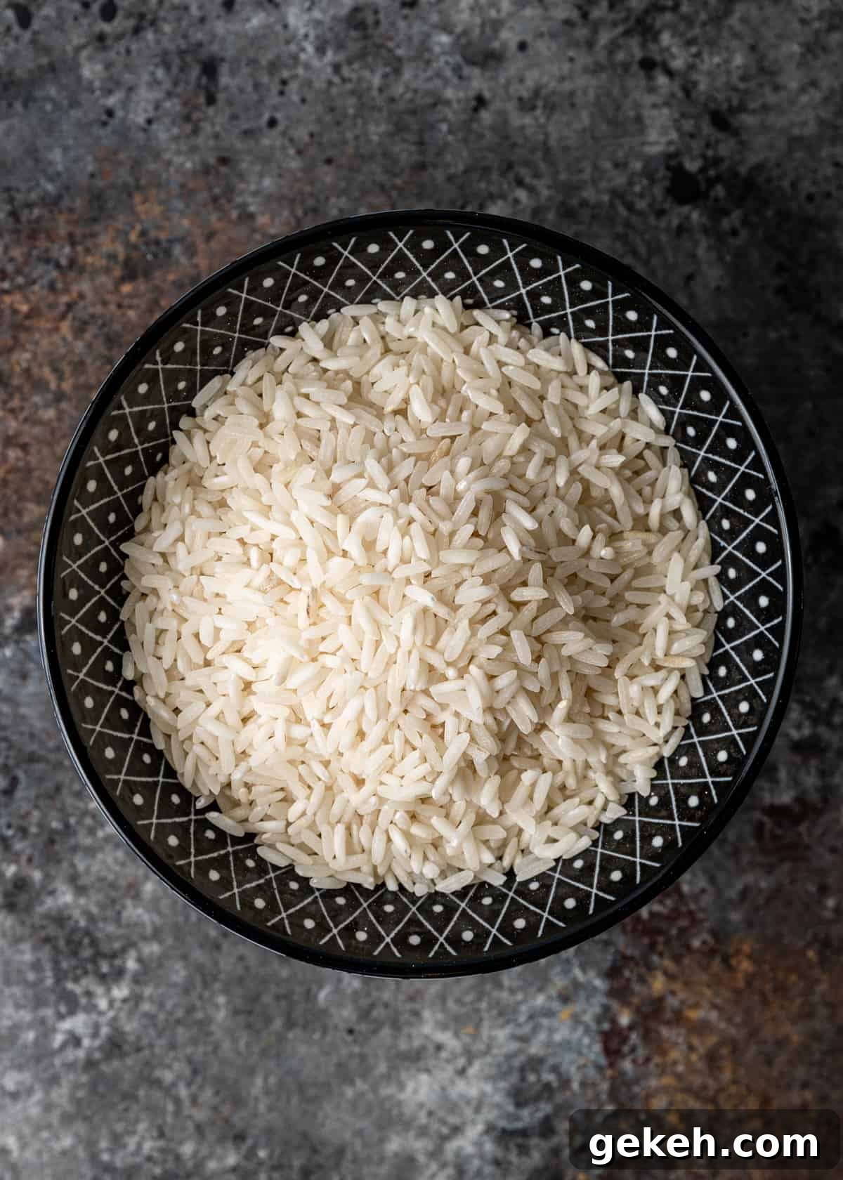 Perfect White Rice Every Time: Simple Stovetop & Rice Cooker Method 3 dry rice in a bowl
