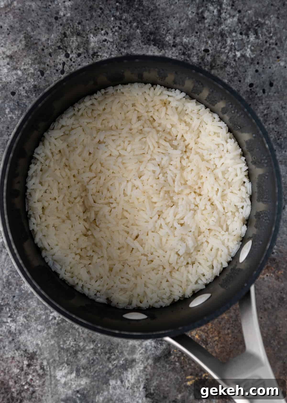 Perfect White Rice Every Time: Simple Stovetop & Rice Cooker Method 5 cooked rice in a pan